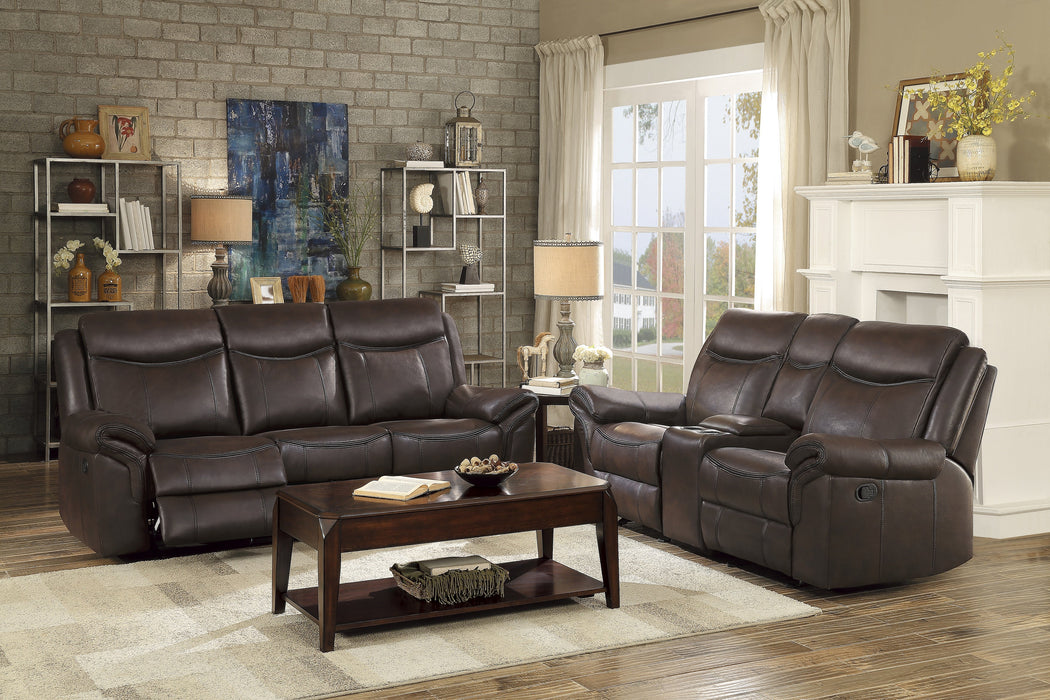 Aram Dark Brown Faux Leather Double Reclining Sofa with Center Drop-Down Cup Holders, Receptacles, Hidden Drawer and USB Ports