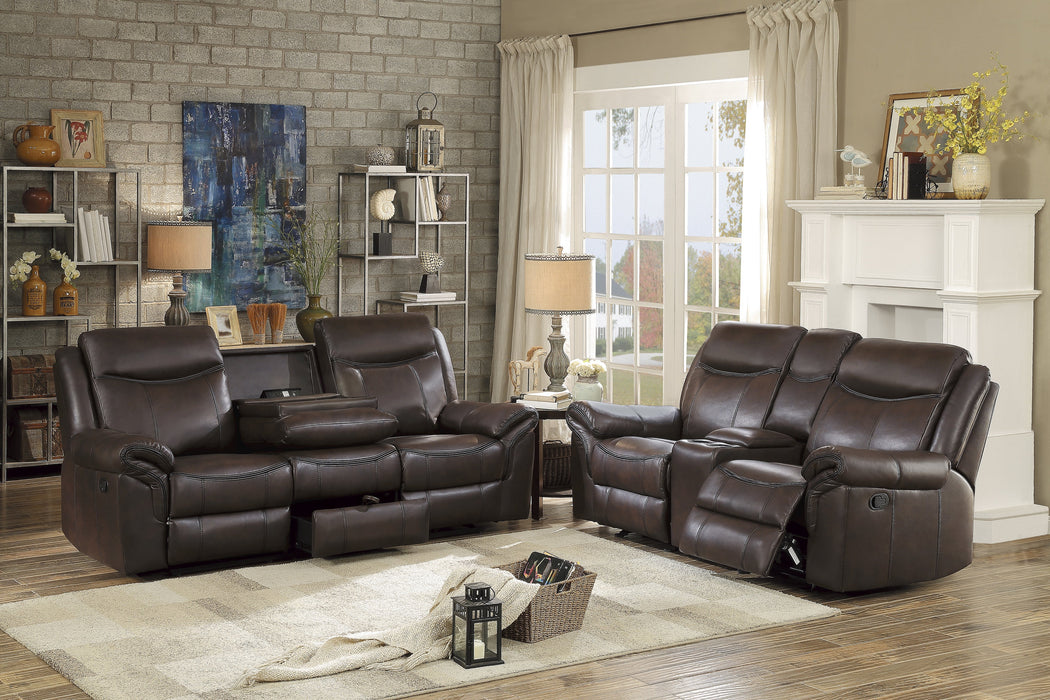 Aram Dark Brown Faux Leather Double Reclining Sofa with Center Drop-Down Cup Holders, Receptacles, Hidden Drawer and USB Ports