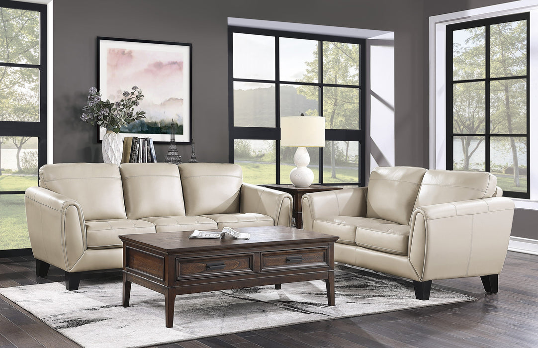 Spivey Beige Leather Loveseat