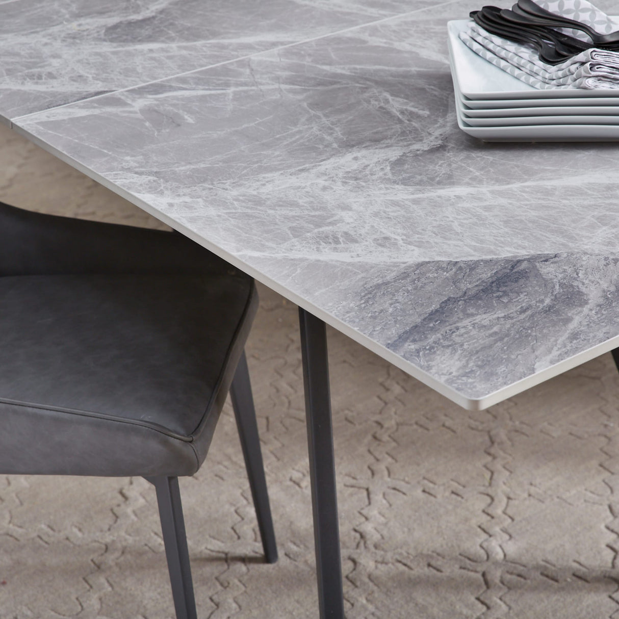 Lucia Extendable Stone Top Metal Leg Dining Table in Piedra and Black