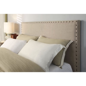 Tavel Nailhead Upholstered Headboard in Toast Linen