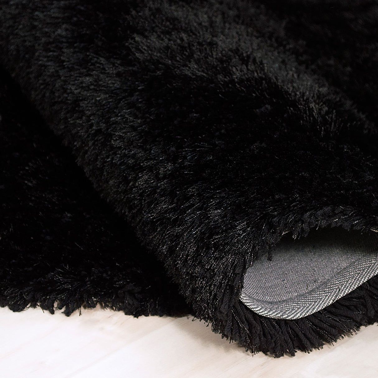 Alma Afro Shag Plain Black Rug